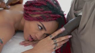 Black teen with red dreadlocks takes masseur's XXX BBC out for blowjob
