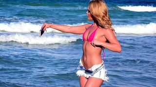 Unleash Your Desires with Abby's Blonde Bombshell Beach Selfie in XXX Video