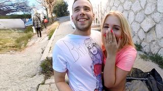 Girl pulls pink T-shirt up to make man see hooters during XXX scoring